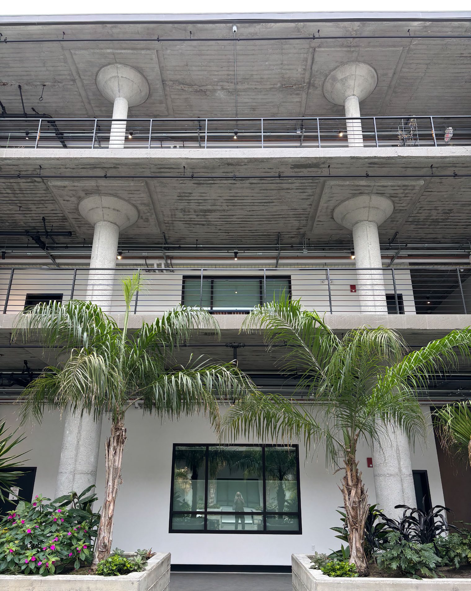 Post-rehab, showing new courtyard and original support columns